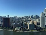 グランドシティタワー月島 高層階からの眺望、川沿いの開放的な都市風景