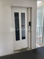G-FLAT エレベーター機能付きのシンプルな共用廊下