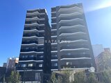 RJRプレシア東十条ガーデン 晴天の下に立つモダンな外観のマンション建物