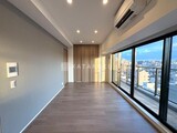 ザ・パークハビオ北千住 大きな窓から都市風景を望む明るいリビングダイニング