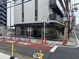 アイフラット品川戸越パークサイド 商業施設の店舗エントランスを備えた建物の低層部外観
