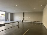 RJRプレシア蒲田 駐車場から見た明るく開放的な駐輪スペース