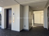 RJRプレシア蒲田 エレベーターホール付きのモダンな共用廊下
