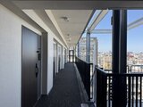 RJRプレシア蒲田 共用廊下から見た街並みを望む開放的なバルコニースペース