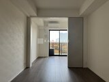 RJRプレシア蒲田 大きなバルコニーへつながる明るいリビングダイニング