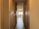 RJRプレシア蒲田 廊下から見たリビングへの開放的な動線と採光の様子