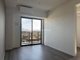 RJRプレシア蒲田 高層階からの眺望を楽しめるバルコニー付きの洋室