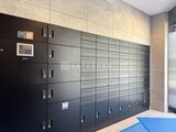 ドゥーエ王子神谷 モダンな共用メールボックスとエントランス空間