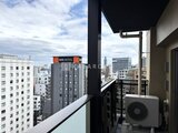 リビオメゾン浅草雷門 高層階から見た都市景観と開放的なバルコニーの様子