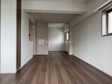 リビオメゾン浅草雷門 落ち着いた木目フローリングのリビングダイニング空間