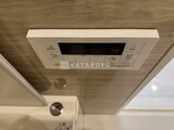 ジーグランデ三ノ輪 浴室天井に設置された操作パネル付きの換気乾燥機