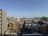 ライブカーサ文京千石プレミア 高層階から見た街並みと遠景の都市風景
