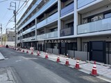 ルフォンプログレ高田馬場ノース 外観と前面道路写真。