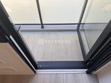 ダフィット錦糸町 開放的な天窓から光が差し込むリビング空間