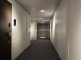 プラウドフラット西蒲田 明るく整理された共用廊下とエレベーター周りの様子