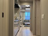 プラウドフラット西蒲田 キッチンから居住空間へと続く、明るく開放的な廊下の様子