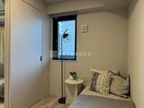 プラウドフラット西蒲田 小窓から採光を取る落ち着いた寝室空間