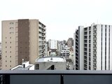 ルフォンプログレ赤羽マークス 高層階からの眺望、周辺建物と都市景観が広がる様子