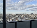 ワンルーフレジデンス中野 高層階からの開放的な眺望、市街地を見渡す景色