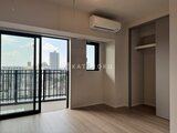 シーズンフラッツ大森北三丁目 バルコニーからの都市景観を望む明るい居室