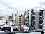 ドゥーエ三ノ輪3 バルコニーから見た都市景観と周辺住宅街の様子