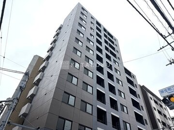 ACPレジデンス中野新橋 前面道路から見たモダンな外観の共有施設