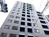 ACPレジデンス中野新橋 下から見上げた近代的なマンションの外観