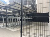 ACPレジデンス中野新橋 開放的な駐輪場と機械式駐車装置が完備された共用スペース