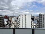 ACPレジデンス浅草 バルコニーから眺める街並みと広がる空の風景