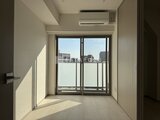 ジェノヴィア北千住 大きな窓から日光が注ぐ明るい洋室
