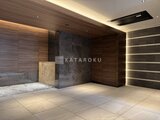 コンシェリア町屋 間接照明で落ち着いた雰囲気の共用ロビー空間