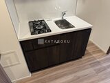 コンシェリア町屋 ガスコンロとシンクが並ぶコンパクトキッチン