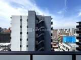 エスレジデンス入谷アレシア 隣接する建物と街並みを望む高層階からの眺望