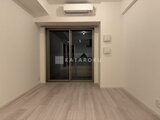 パークアクシス品川シーサイド 明るい床と広窓から光が入るリビングダイニング空間