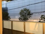 パークアクシス品川シーサイド バルコニーから眺める夕焼けと緑が映る開放的な空間