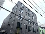 Aglaia 千石 Deux 深色タイルを貼った落ち着いたモダン建築の外観
