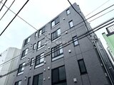 Aglaia 千石 Deux 落ち着いた印象のタイル張り建物外観