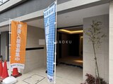 グランカーサ住吉2 建築中の新築物件の明るいエントランスホール入口
