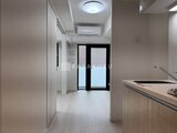 グランカーサ住吉2 キッチンから玄関方向を見た開放的な間取りの様子