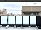グランカーサ住吉3 高層階のバルコニーから見た開放的な都市風景