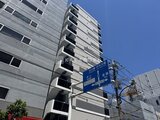 アーバネックス錦糸公園3 青空を背景にした、落ち着いたグレー調の建物外観