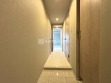 ビューテラス茗荷谷 明るい照明が心地よい廊下から各室へアクセスする空間