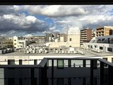 ビューテラス茗荷谷 建物の屋上から見た開放的な街並みの風景