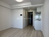 OAKLANCE森下2 明るい印象のリビングダイニングとオープンキッチンの一体空間