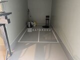 THE PALMS大島 建築工事中の躯体部分、床枠と白い壁が見える内部空間
