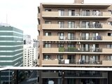 クレヴィアリグゼ蒲田西 都市街並みを背景にした建物の外観全体像