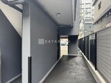 アークマーク大塚 建物奥へと続く落ち着いた印象のアプローチ通路
