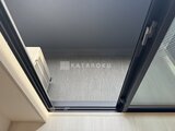 アークマーク大塚 バルコニーへ続く開放的なガラス戸からの眺め