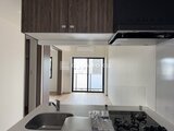 CREATIF本所吾妻橋 キッチンから居間へと続く開放的なリビングダイニング空間