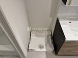 コンフォリア・リヴ押上ノース トイレ空間に設置されたシンプルな白色の洗浄便座